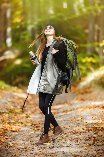 Tourist Girl in the Forest