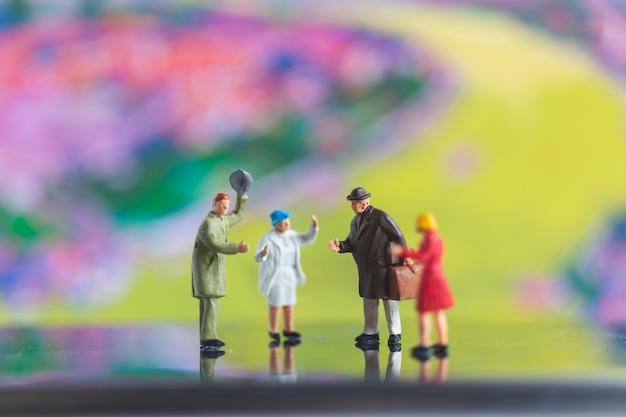 Tourist handshake with friend on colorfull background 