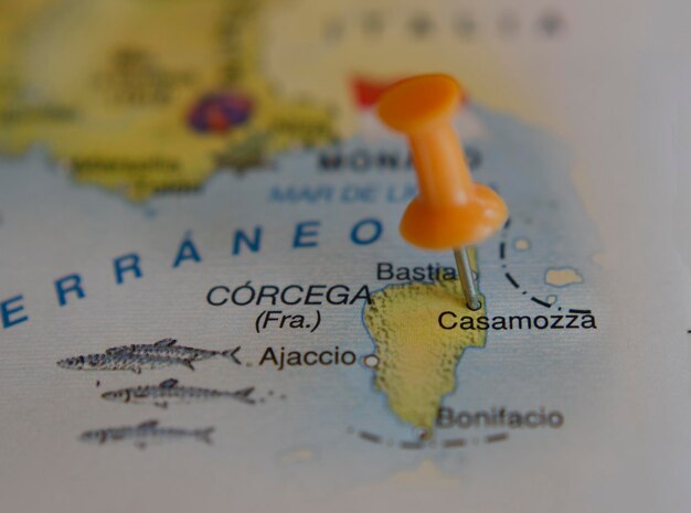 tourist map of the city of Casamozza in Corsica in travel and vacation concept with a pin marking the city