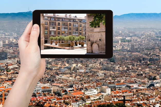 Tourist photographs of square in Marseilles city