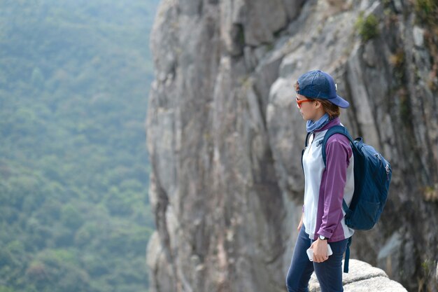 Tourist relaxing on the mountain