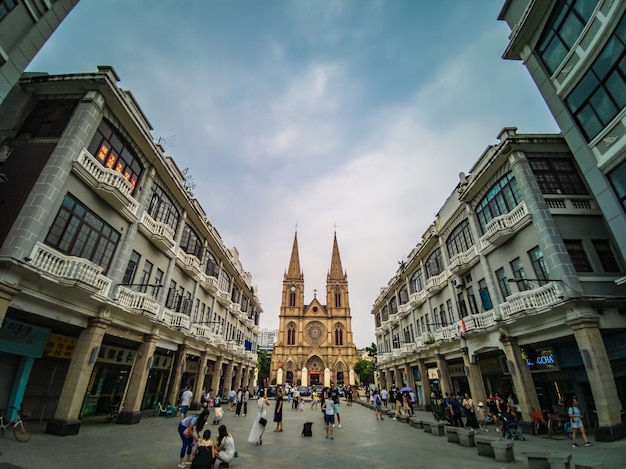 Tourist Take photo with Sacred Heart Cathedral at Guangzhou China. The Sacred Heart Cathedral is a Catholic Church in the Diocese of Guangzhou 중국