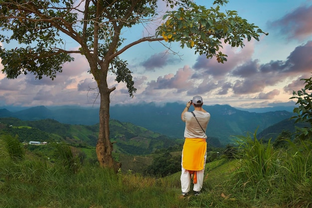 Tourist taking photos of the landscape