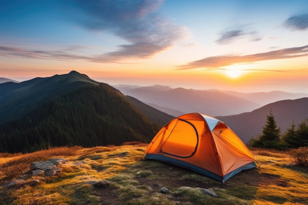 Tourist tent in the mountains at dawn in the summer