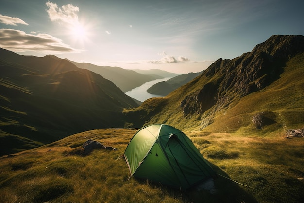 A tourist tent pitched on top of a mountain at sunrise Tourism and physical activity concept