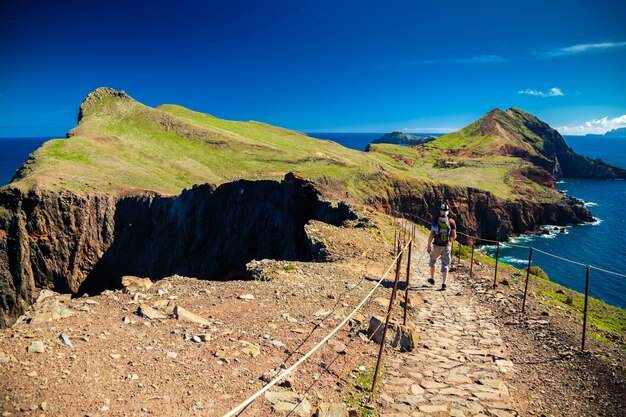 Tourist walking on a trekking path