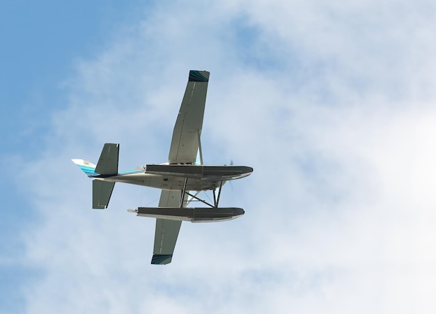 Tourist water plane in the clouds