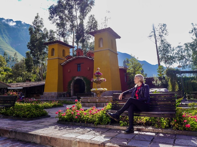 Tourist woman in Yucay Church in the Sacred Valley of the Incas in the city of Cusco