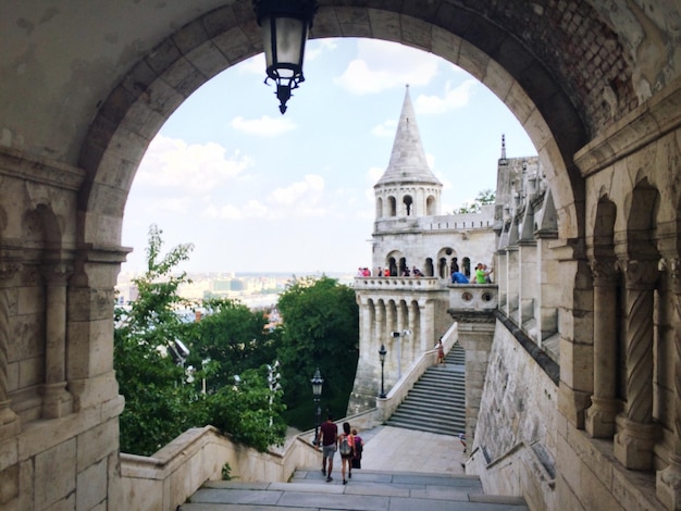 Photo tourists against sky