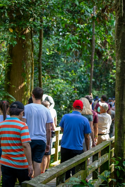 Tourists in the Animal Conservation Park, a tourist destination in Southeast Asia, Sandakan, Sabah, Borneo, Malaysia