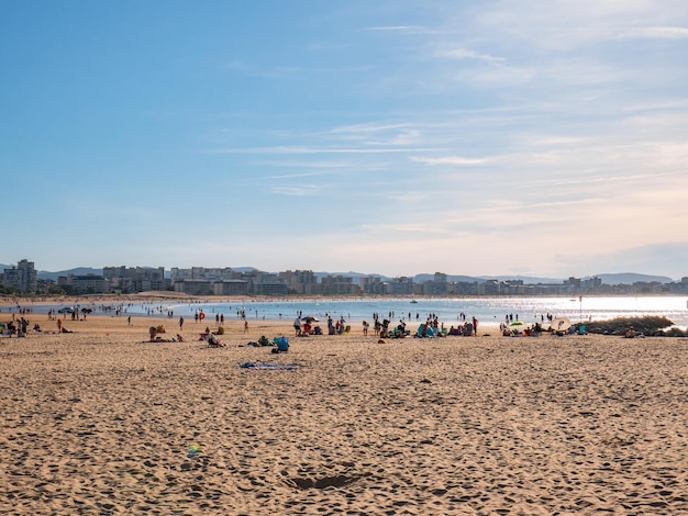 Tourists enjoying the beach of La Salve de Laredo the longest sandy beach in Cantabria and the most beautiful in Spain