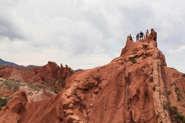 Tourists in Fairytale Canyon Skazka in Kyrgyzstan