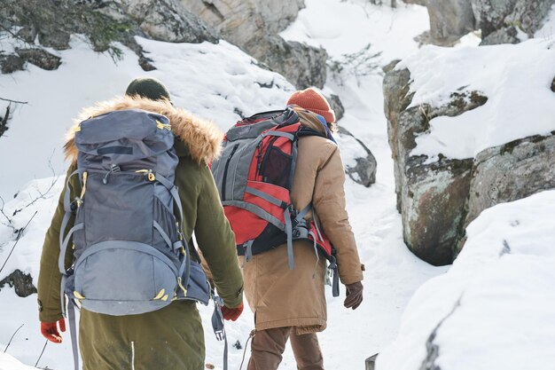 Tourists hiking in winter