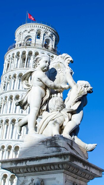 Tourists near the leaning tower of pisa in italy