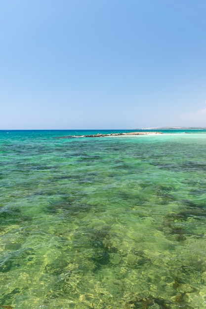 Tourists relax on the beautiful Ayia Thekla Beach