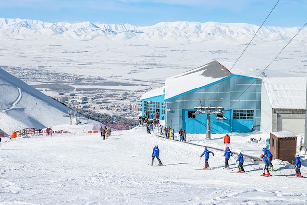 Tourists skiing in Palandoken mountain. Enjoying skiing on a sunny day