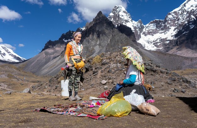 Tourists on their way to the Ausangate mountain in the city of Cusco