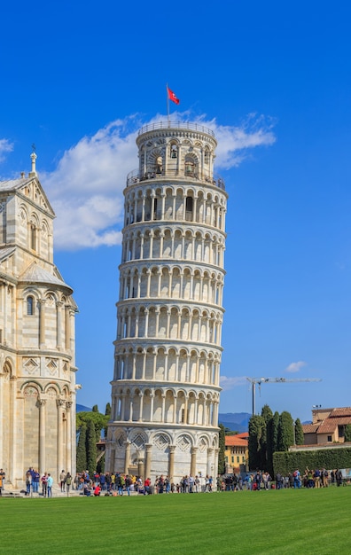 Tourists visit the famous leaning tower Pisa Italy