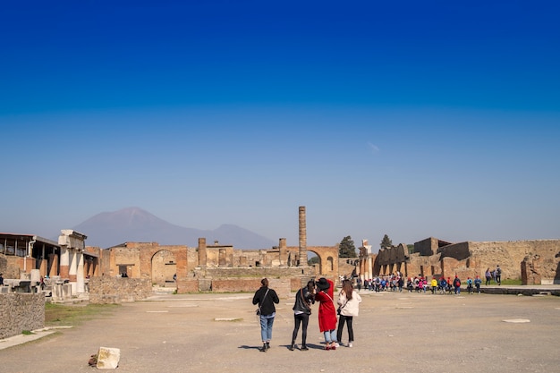 Tourists visiting pompeii