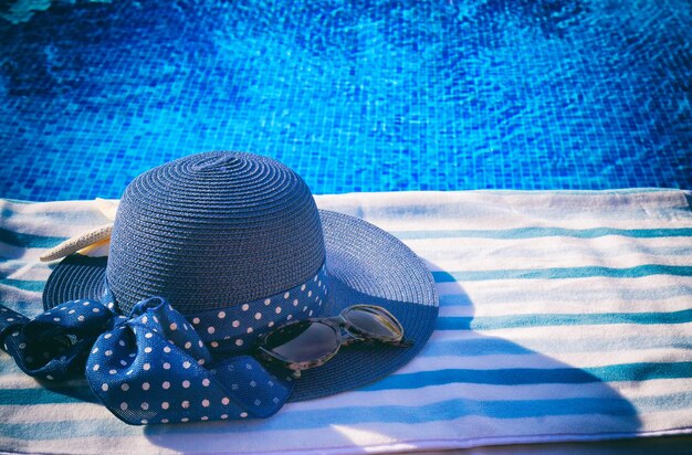 Towel and bathing accessories near pool