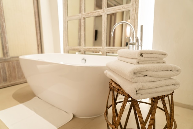 towel with bath tub in luxury bathroom