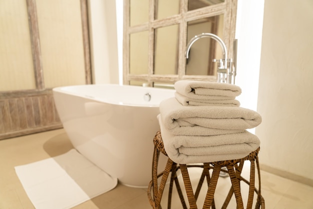 towel with bath tub in luxury bathroom