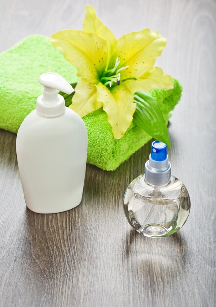 Towel with flower  and bottles