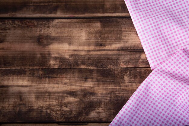 towel over wooden table background