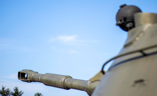 Tower of an armored personnel carrier or tank heavy weapons of
war sky background army equipment