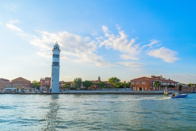 The tower of the lighthouse on the island of glassmakers of Murano - Venice, Italy