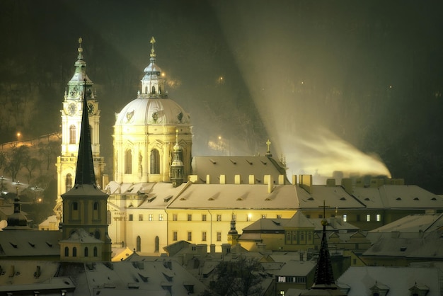 Tower of St Nicolas church during winter Prague Czech republic