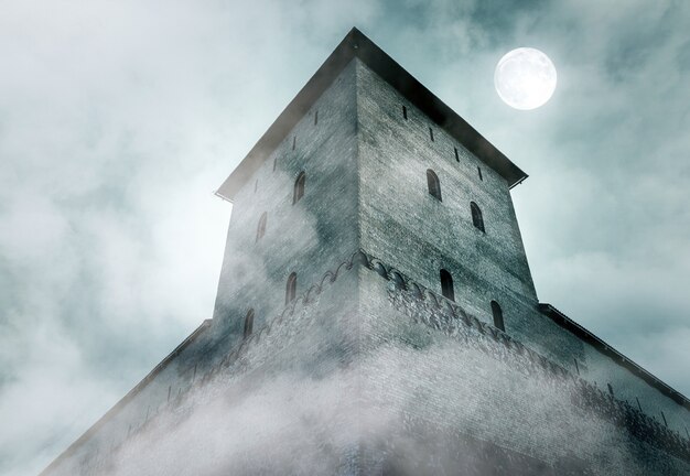 Tower and wall of the medieval castle fortress during foggy night with moonlight