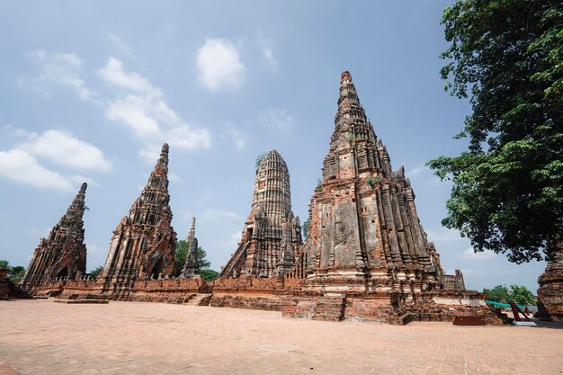 Towers prangs of Wat Chaiwatthanaram in Ayutthaya Thailand Scenic ruins of buddhist temple in the ancient city of the Ayutthaya Kingdom Siam Thailand is a popular tourist destination of Asia