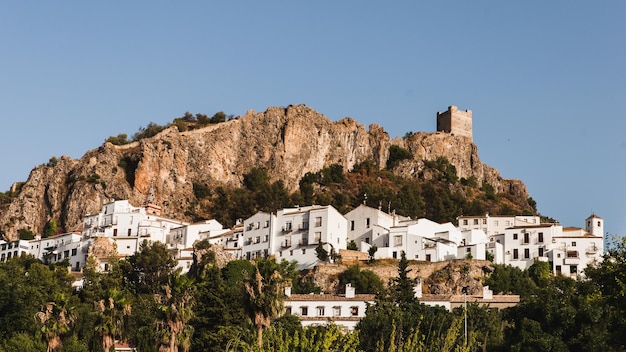 Town built on a mountain with a castle