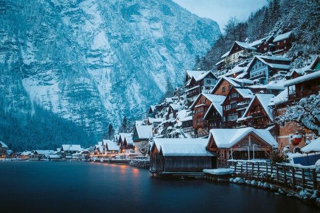 Townscape by lake at dusk