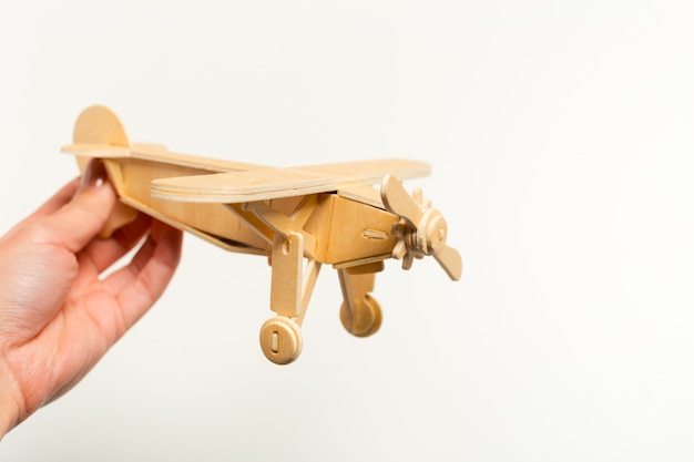 Toy airplane in hand