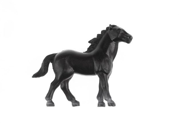 Foto giocattolo cavallo nero isolato su sfondo bianco