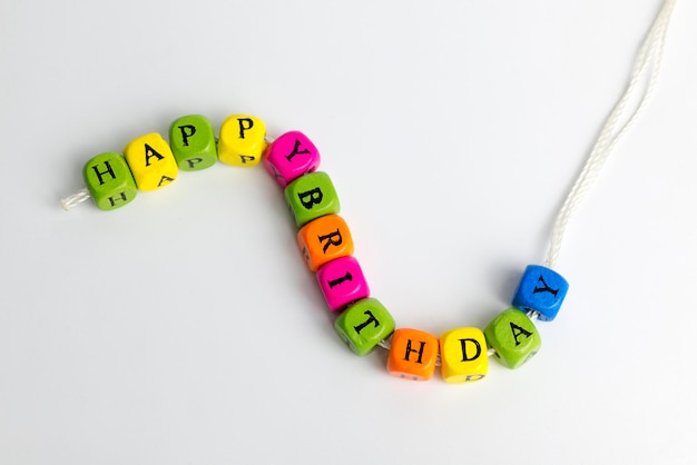 Toy blocks spelling out HAPPY BIRTHDAY