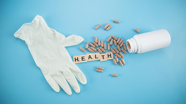 Toy bricks on the blue table with word health