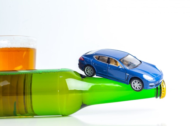 Toy car on bottle