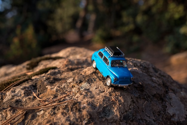 Toy car on the rock