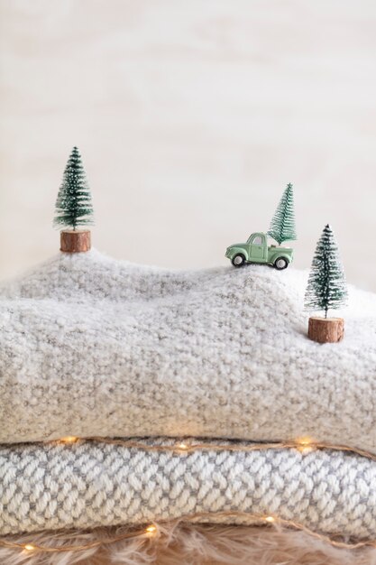 Toy car with a christmas tree, bokeh background