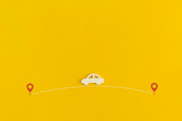 Toy car on a yellow background. Top view. Flat lay.