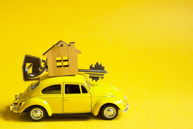 Toy car in yellow background