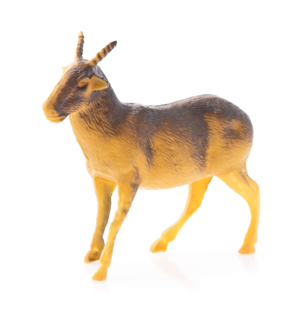 Toy Dorcas gazelle made of plastic isolated on white background