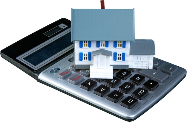 Photo toy house and calculator ,mortgage calculator