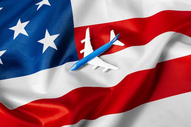 toy jet plane and flag of USA.