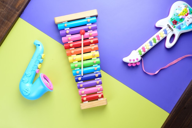 Toy Musical instruments on wooden background