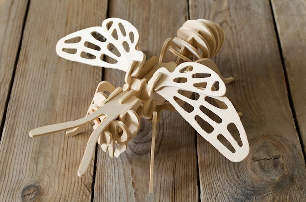 The toy plane from wooden parts. Educational designer for children