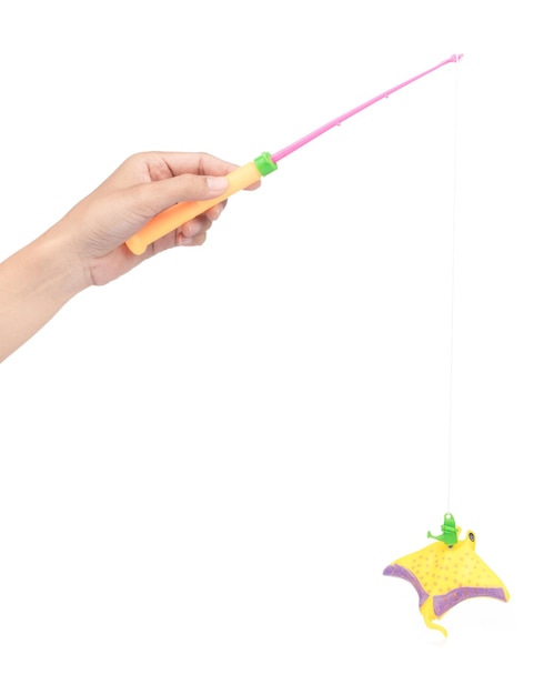 Premium Photo  Toy plastic fishing rod with fish isolated on